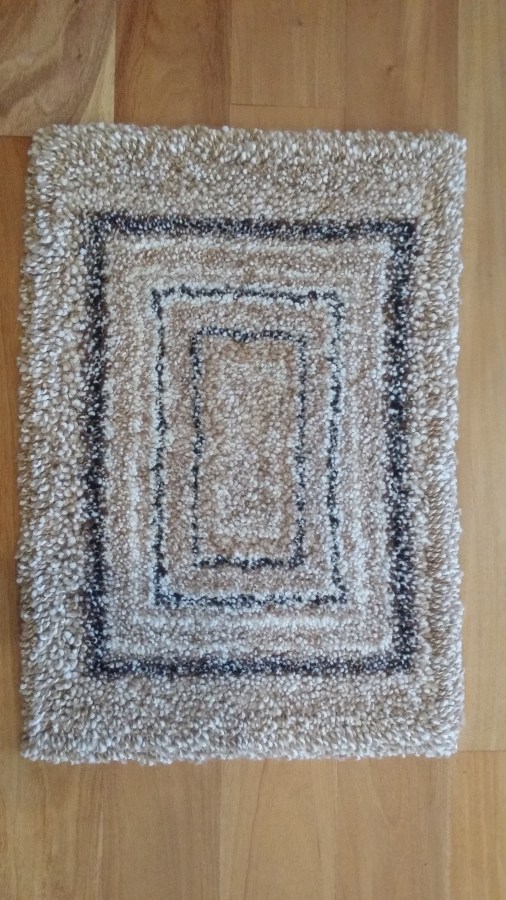 Hand knotted alpaca fibre oblong mat 70cm x 48cm $215 NZD